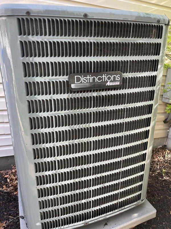 Completed outdoor portion of preventive maintenance agreement cooling visit on Amana Distinctions condenser unit. Performed visual inspection of unit exterior, housing, and condenser coil fins, documenting current condition with photos showing normal weathering and dirt accumulation on lower coil sections consistent with outdoor exposure.