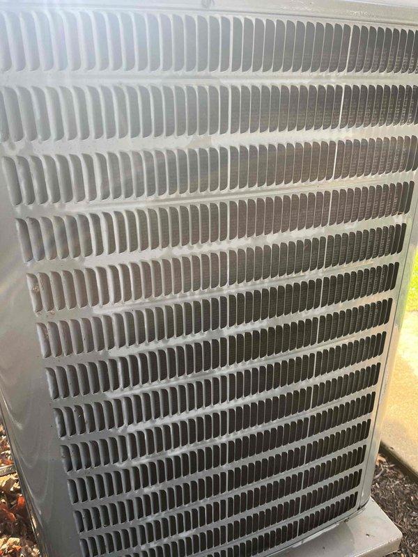 Completed outdoor portion of preventive maintenance agreement cooling visit on Amana Distinctions condenser unit. Performed visual inspection of unit exterior, housing, and condenser coil fins, documenting current condition with photos showing normal weathering and dirt accumulation on lower coil sections consistent with outdoor exposure.