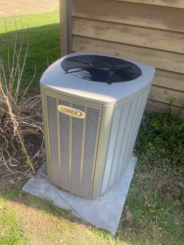 Completed comprehensive cooling season tune-up on Lennox condensing unit located on side of home. Performed full system inspection including control board diagnostics, electrical connections verification, refrigerant level assessment, condenser coil cleaning, and fan motor operation testing. All components found operating within manufacturer specifications; system ready for cooling season.