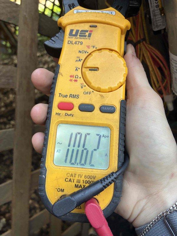 Performed seasonal cooling tune-up on 3-year-old residential HVAC system located in attic. Conducted comprehensive inspection of blower assembly, which showed normal condensation accumulation on drum housing. Verified electrical performance using digital multimeter, confirming proper amperage draw at 100.7A. Inspected air filter, ductwork connections, and cabinet interior. System operating within normal parameters with no deficiencies noted.