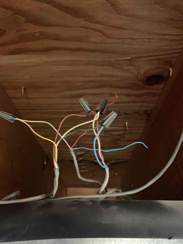 Responded to service call for newly installed Nest thermostat displaying "no power" error with HVAC system inoperative. Upon inspection, discovered improper low-voltage wiring connections at the air handler, with multiple wire terminations requiring correction. Rewired thermostat control circuit using proper wire nuts and connections, verified 24V power supply to thermostat, completed setup through Google Home app, and confirmed both heating and cooling functions operational.