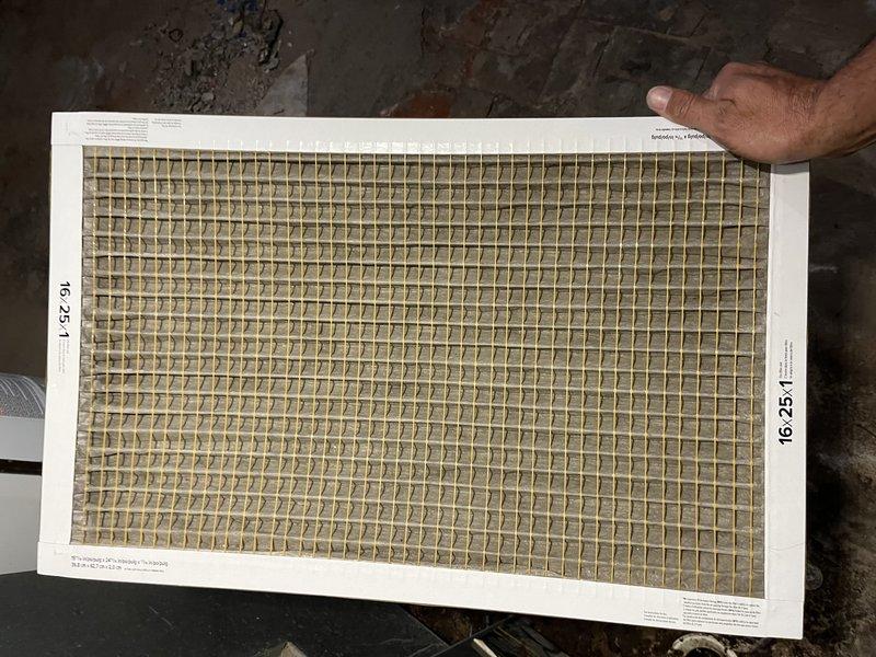 Responded to no heat call and performed system inspection. Found heavily soiled air filter restricting airflow to furnace, causing system shutdown due to limit switch activation. Replaced dirty 16x25x1 filter with new unit, restored proper airflow, and verified system operation. Unit returned to normal heating function with adequate airflow and proper temperature rise across heat exchanger.