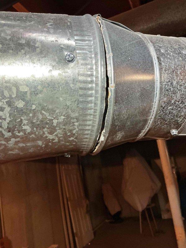 Replaced defective swivel tee and associated ductwork fittings in HVAC system. Installed new 7x4x4 swivel tee, 7" tee, 7-3" reducer, sections of 4" and 3" pipe, along with multiple 90-degree elbows to restore proper airflow and eliminate moisture condensation issues observed at connection points. Removed and disposed of failed components, ensuring all new ductwork connections were properly sealed and secured.