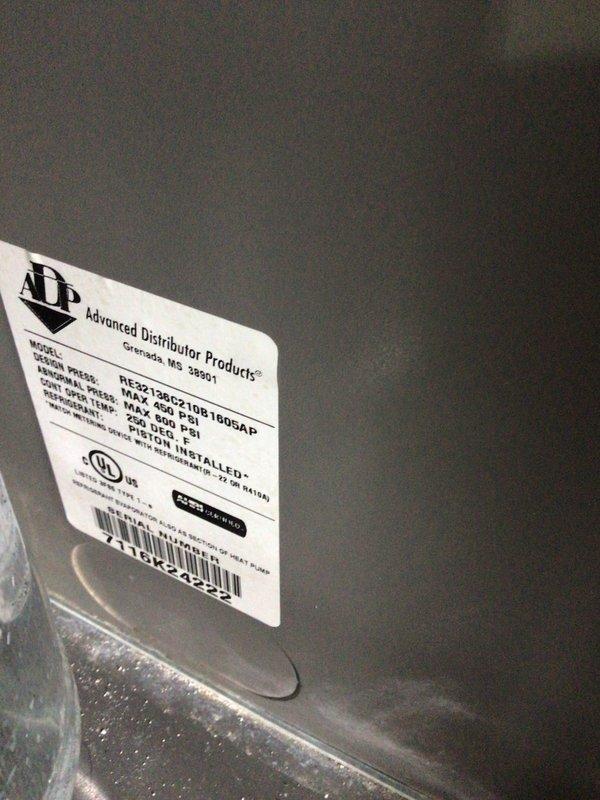 Completed comprehensive cooling system tune-up on 10-year-old AC unit located at side of home. Performed standard maintenance procedures including inspection of Advanced Distributor Products air handler unit, verified system specifications and operational parameters, documented filter size requirements (16x25x1), and captured equipment nameplate data for service records.