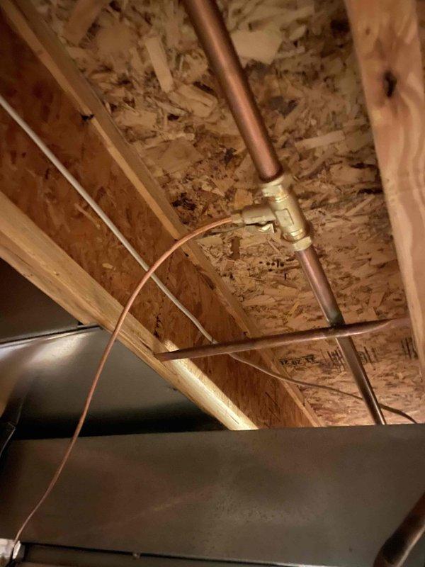 Completed installation of 600M whole-home humidifier unit integrated with existing HVAC ductwork system. Connected humidifier to water supply line using copper piping with appropriate fittings and mounted unit to main supply plenum. Verified proper operation of heating and cooling system following installation.