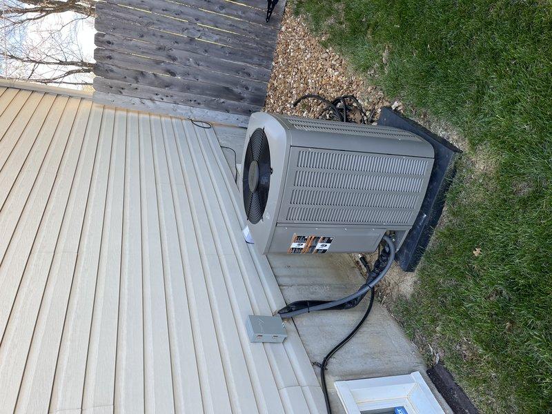 Completed comprehensive tune-up maintenance on a 3-year-old outdoor air conditioning unit per Home Depot service agreement. Performed standard preventive maintenance procedures including inspection of condenser coils, fan operation, electrical connections, and refrigerant levels. Unit found in normal operating condition with typical debris accumulation between coil fins; cleaned and restored system to optimal performance specifications.