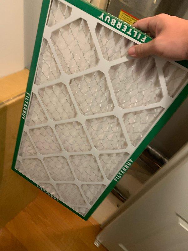 Completed comprehensive cooling season tune-up on 6-year-old residential air conditioning system. Performed full system inspection including electrical connections, refrigerant levels, condenser coil cleaning, and blower motor operation verification. Installed new FILTERBUY pleated air filter to ensure proper airflow and system efficiency for the cooling season.