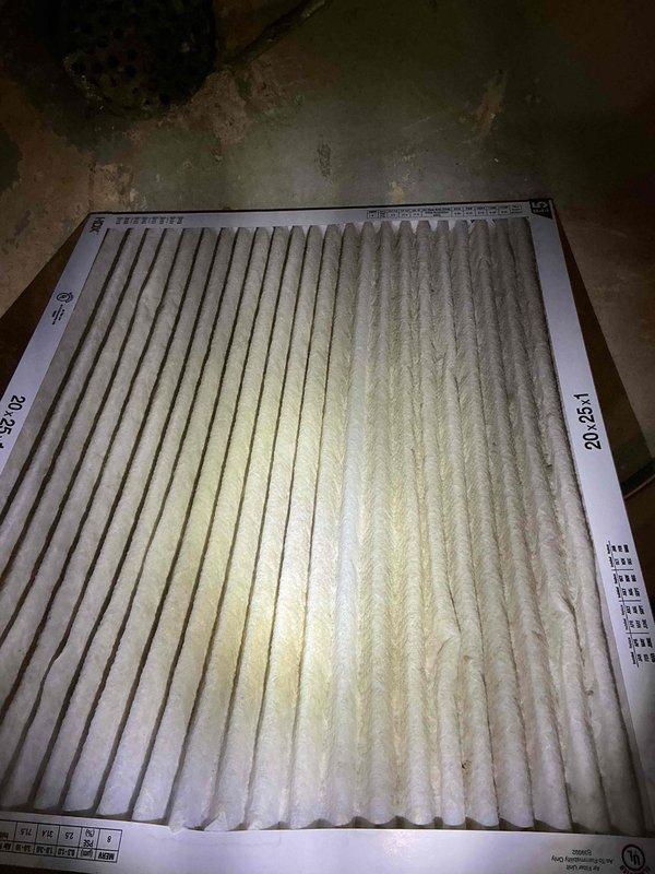 Completed comprehensive tune-up service on two 8-year-old residential AC units located at side of home. Performed standard maintenance procedures including inspection of blower motor assembly, capacitor, and electrical connections; all components found in proper working condition. Replaced heavily soiled 20x25x1 pleated air filter to restore proper airflow and system efficiency.