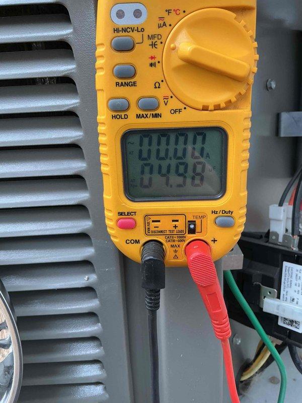 # HVAC Cooling System Tune-Up Completed

Performed comprehensive preventive maintenance tune-up on a one-year-old residential air conditioning unit located in the backyard. Conducted thorough inspection of the system's control cabinet, accessing internal electronic components including circuit boards, pressure switches, and wiring connections. Verified proper operation of all control sequences and safety devices within the furnace panel.

Utilized digital multimeter to perform electrical diagnostics, measuring voltage and amperage readings to ensure system is operating within manufacturer specifications. All electrical measurements fell within acceptable parameters. Inspected wire connections, securing loose wiring with appropriate fasteners and verifying all terminations were tight and secure.

Examined control board components, capacitors, and integrated circuits for signs of wear or damage. All electronic components showed normal operation with no visible defects. Pressure switch an