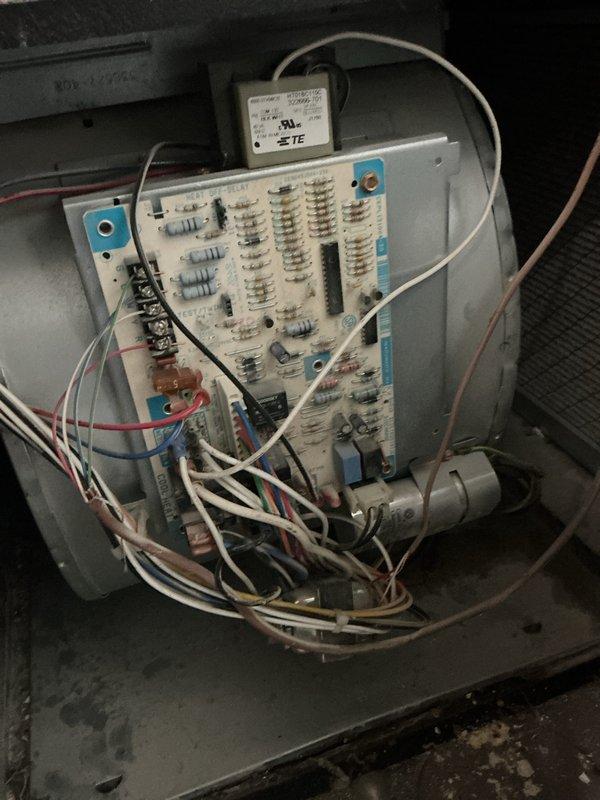 Completed seasonal cooling maintenance on single residential HVAC unit located at side of house. Performed comprehensive tune-up inspection including control board examination, verified electrical connections, and documented equipment specifications. Unit is an International Comfort Products system manufactured February 2017, model NSMSNGTGT1GA3, with 96,000 BTU/HR capacity operating on 115V/60Hz/1-phase power. Noted evidence of heat stress on control board terminal block connections and documented current system condition through photographic records for maintenance history.