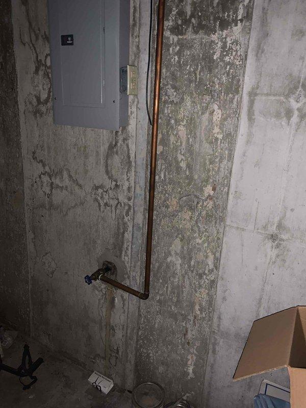 Replaced a 35-year-old 40-gallon electric water heater that was leaking from the bottom with a new 40-gallon electric tall unit in the basement. Installed a 3/4-inch pressure reducing valve as part of the installation and connected all necessary copper supply lines and pressure relief valve plumbing. The unit was set up and delivered for installation without obtaining a water heater permit per customer specifications.