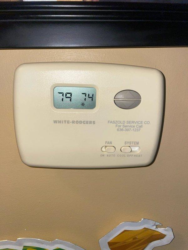 Responded to no cooling complaint on residential air conditioning system over 10 years old. Upon arrival, verified thermostat settings and found unit calling for cooling with indoor temperature at 79°F and setpoint at 74°F. Inspected outdoor condenser unit and identified system malfunction preventing proper operation. Diagnosed issue, performed necessary repairs to restore cooling function, and confirmed system operating properly before departure.