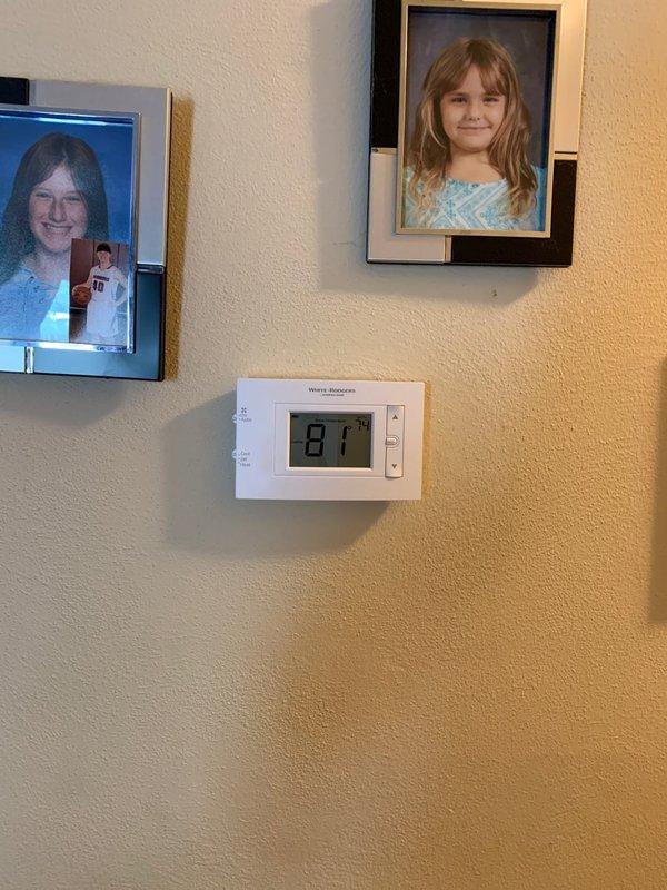 Responded to no cooling complaint on residential HVAC system. Upon arrival, verified thermostat calling for cooling with display reading 81°F. Proceeded to outdoor unit located at ground level to diagnose issue. Connected Fieldpiece digital manifold gauges to service ports and recorded system pressures. High side pressure reading showed 349.9 PSIG with ambient temperature at 135°F, indicating significantly elevated head pressure. Low side pressure measured at 100 PSIG, well above normal operating range for cooling mode.

Diagnosis revealed system was severely overcharged with refrigerant, preventing proper heat exchange and cooling capacity. Recovered excess refrigerant from system to bring pressures within manufacturer specifications. Monitored pressures during recovery process until achieving proper operating parameters. Verified compressor amperage draw returned to normal range after refrigerant adjustment.

Cycled system through multiple cooling cycles to confirm proper operation. 