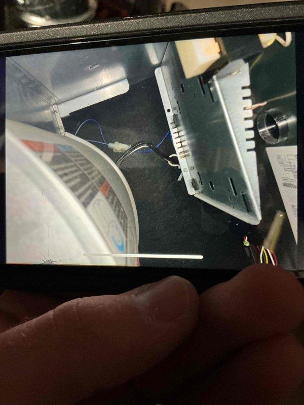 Completed cooling season tune-up on 5-year-old ground-level AC unit located in basement. Performed comprehensive system inspection including electrical connections, refrigerant levels, and airflow verification. Replaced air filter with new pleated media filter and documented equipment condition with photos of blower assembly and control board.