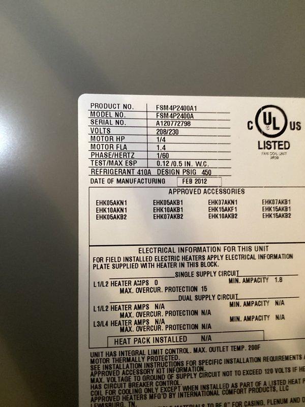 Responded to no cooling call on 10+ year old FSM4P2400A unit located in side yard. Upon arrival, found outdoor condenser would not power on. Performed diagnostic evaluation and documented unit specifications showing February 2012 manufacture date with R-410A refrigerant system. Inspected electrical connections, conduit, and disconnect box mounted on exterior wall. Identified issue preventing system operation and restored cooling functionality to unit.
