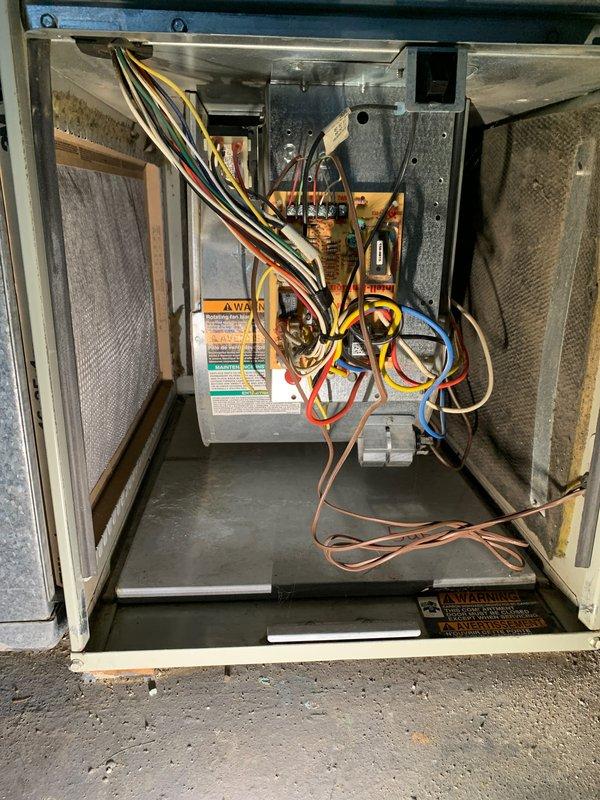 Completed cooling system tune-up on 2005 AC unit, performing standard maintenance protocol including inspection of evaporator coil, refrigerant lines, electrical connections, and air filters. Noted previous gas leak issue addressed by utility company and identified unsealed opening in basement brick wall where furnace and water heater flue penetrates, recommending proper sealing to prevent air infiltration and maintain building envelope integrity. All cooling system components operating within normal parameters upon completion of service.