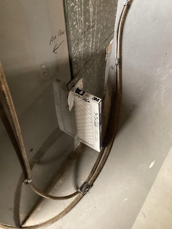 Completed comprehensive tune-up service on single outdoor condensing unit for Home Depot maintenance agreement. Performed system inspection revealing moderate dust and debris accumulation on condenser coil fins; verified all electrical connections, capacitor function, and refrigerant line integrity. Documented airflow direction at indoor air handler, confirmed proper installation of filtration media, and captured equipment condition photos showing unit operational with minor cosmetic weathering consistent with outdoor exposure.