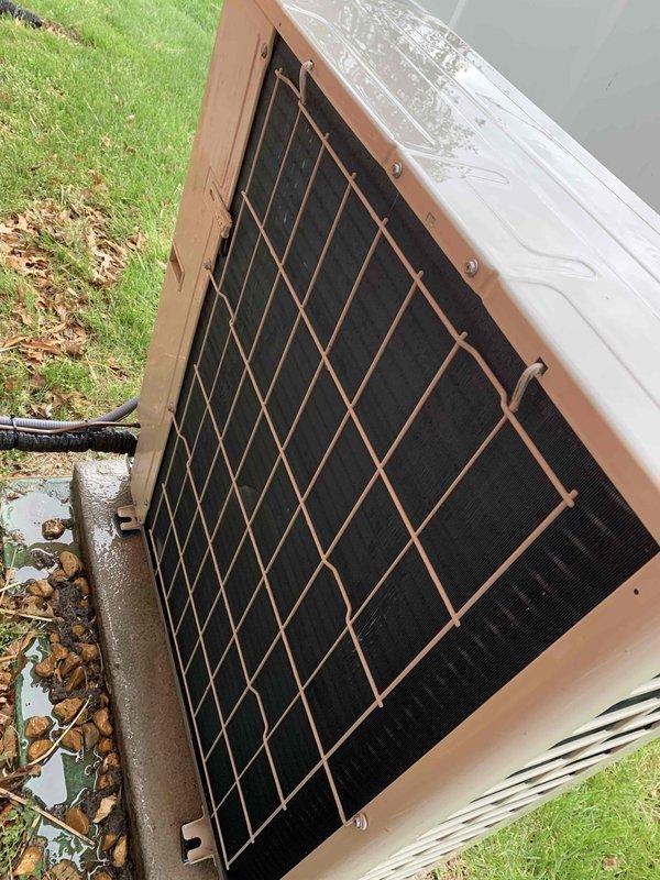 Completed comprehensive cooling season tune-up on outdoor condensing unit located on side of home. Performed full system inspection including electrical connections, refrigerant levels, condenser coil cleaning, and operational testing. All components found functioning within normal parameters, unit operating efficiently with no immediate service needs identified.