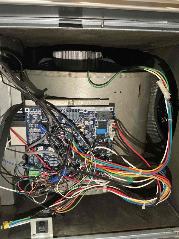 Completed preventive maintenance tune-up on a 9-year-old residential air conditioning system. Performed comprehensive inspection of outdoor condensing unit, verified refrigerant line insulation integrity, and evaluated control board wiring and electrical connections within the air handler. All components found operating within normal parameters.