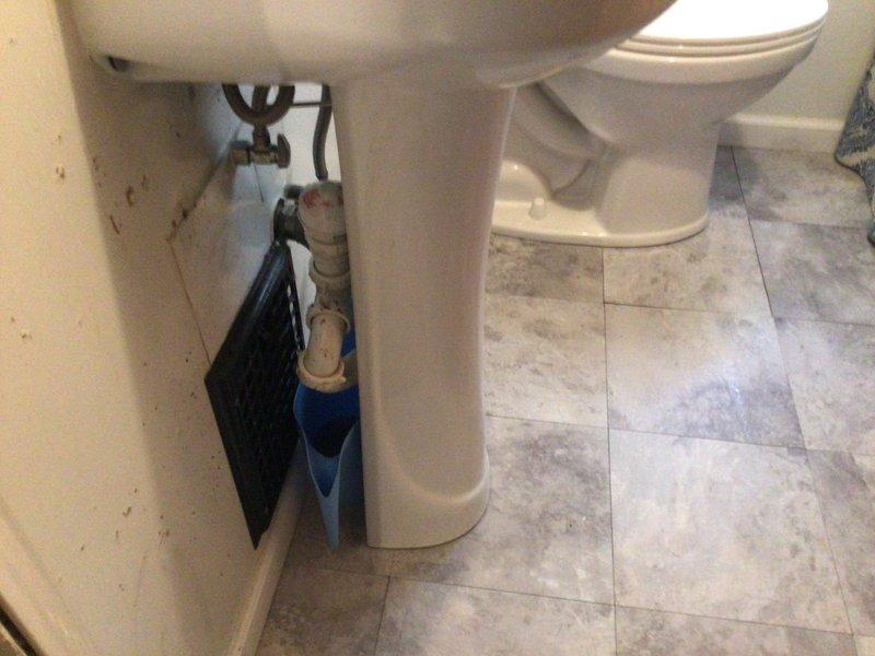 Responded to service call for clogged bathroom sink on second floor hallway bathroom. Upon arrival, assessed the pedestal sink and determined blockage in drain line. Removed obstruction from drain assembly using appropriate plumbing tools. Tested water flow and drainage to confirm proper operation. Inspected visible plumbing connections beneath sink to ensure no leaks or additional issues. Left fixture in full working order with clear drainage.