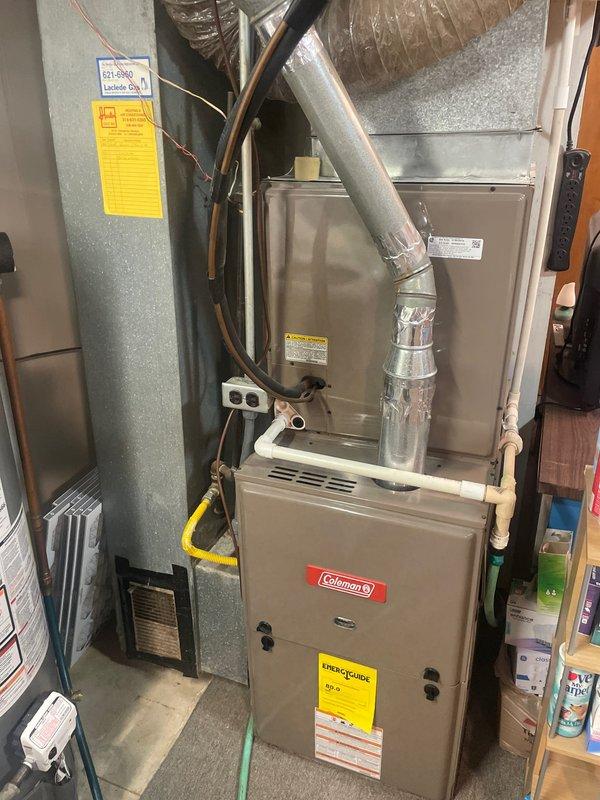 Responded to no cooling complaint on 5-year-old Coleman HVAC system. Performed diagnostic evaluation of system components including furnace unit, air handler, and White-Rodgers programmable thermostat. Identified U10 fault code and completed necessary repairs to restore proper cooling operation to the system.