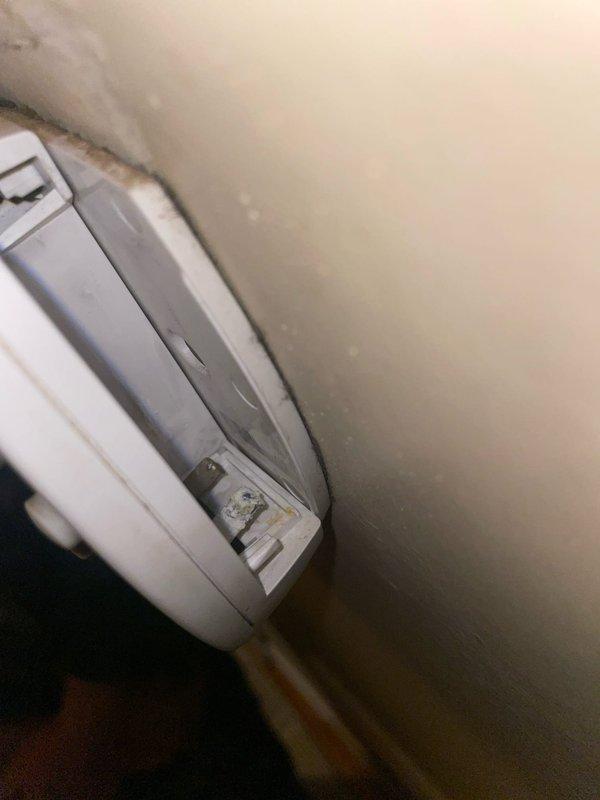 Responded to service call for malfunctioning Trane thermostat in hallway that was shutting off when touched. Inspected wall-mounted thermostat and ductless mini-split indoor unit, diagnosed intermittent power issue caused by loose wiring connection at thermostat base. Secured all wire terminals, tested thermostat functionality and communication with system, verified proper operation and temperature control response.