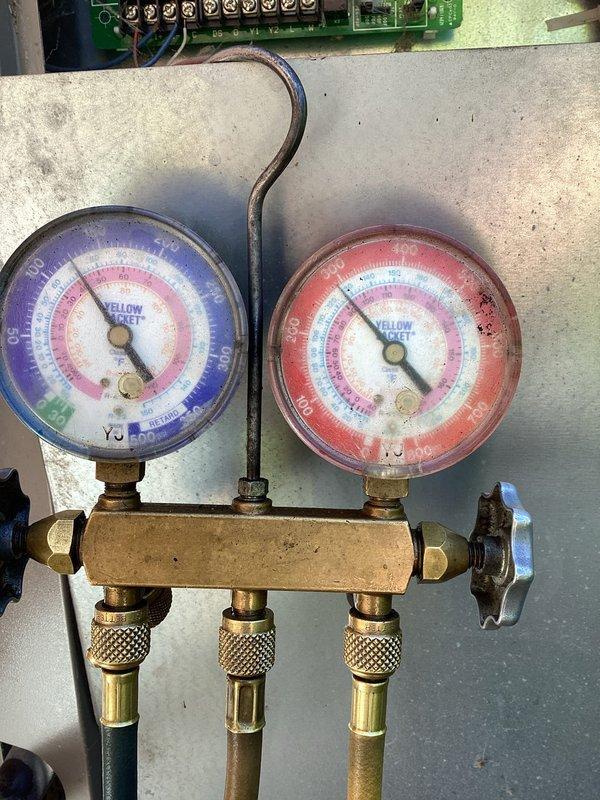 Replaced defective evaporator coil and schrader core on residential HVAC system. System was evacuated, new evaporator coil installed in air handler, and refrigerant lines reconnected with new schrader core. Unit was pressure tested, evacuated to proper vacuum specifications, recharged with refrigerant, and verified for proper operation with manifold gauges.