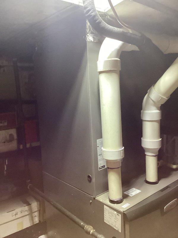 Replaced defective evaporator coil and schrader core on residential HVAC system. System was evacuated, new evaporator coil installed in air handler, and refrigerant lines reconnected with new schrader core. Unit was pressure tested, evacuated to proper vacuum specifications, recharged with refrigerant, and verified for proper operation with manifold gauges.
