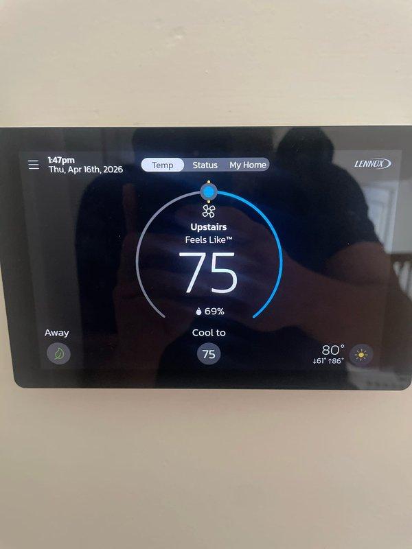 Responded to no-cooling complaint on 2-year-old Lennox variable-speed heat pump system with iced refrigerant line. Diagnosed upstairs unit showing elevated superheat at 36°F and low subcooling between 2-5°F, indicating refrigerant undercharge. Downstairs unit operating within normal parameters. System under warranty; documented findings and recommended contacting installer for warranty refrigerant charge correction.