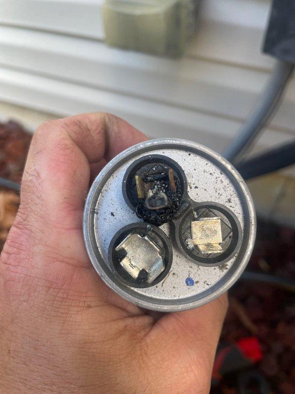 Responded to service call for AC unit that would not shut off. Diagnosed faulty capacitor on outdoor condensing unit showing signs of terminal corrosion and deterioration. Replaced defective capacitor and disconnected orange thermostat wire. Tested system operation and verified unit now cycles properly on and off as commanded by thermostat. System restored to normal operation.