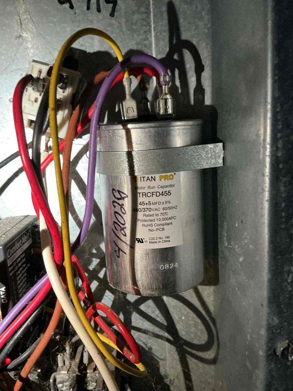 Responded to after-hours no cooling call on Goodman CAPF3636B6DB central air conditioning unit. Upon inspection, diagnosed failed dual run capacitor (TITAN PRO TRCFD455, 370VAC) preventing compressor operation. Replaced defective capacitor, verified proper electrical connections, tested system operation, and confirmed unit cooling properly before customer's extended travel departure.