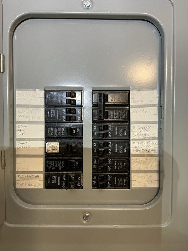 Responded to no power condition affecting garage area. Located electrical panel in basement and performed visual inspection of circuit breakers and panel components. Identified tripped breaker serving garage circuit. Reset affected breaker and verified power restoration to garage area. Confirmed all circuit breakers properly seated and panel operating within normal parameters.