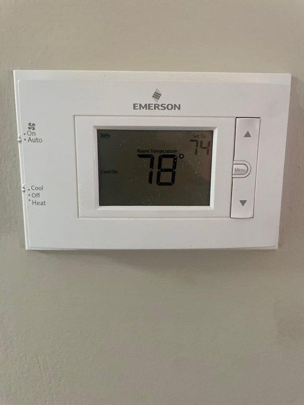 Responded to recall for intermittent air conditioning operation on system under 10 years old. Upon arrival, verified thermostat was calling for cooling at 78°F setpoint and system was cycling improperly. Inspected outdoor unit, indoor air handler, and thermostat wiring for loose connections or component failures causing intermittent operation.
