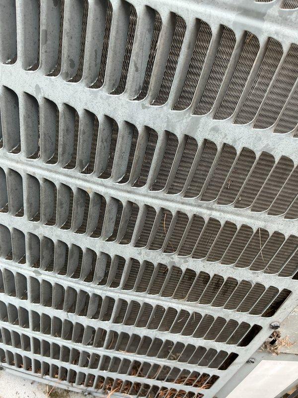 Completed cooling season tune-up on 16-year-old outdoor condensing unit. Inspected and cleaned evaporator coil, which showed minor dust accumulation between fins but remained in functional condition. Checked air filter condition at air handler, confirmed proper airflow, and verified all system components were operating within normal parameters for seasonal cooling operation.