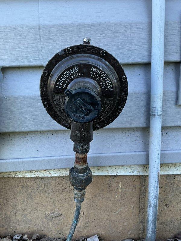 Conducted on-site electrical estimate for standby generator installation. Inspected and documented existing natural gas infrastructure, including gas meter regulator mounted on exterior wall and secondary pressure regulator assembly with control valves and copper gas line connections. Evaluated gas supply capacity and pressure regulation equipment to determine compatibility with proposed generator system requirements.