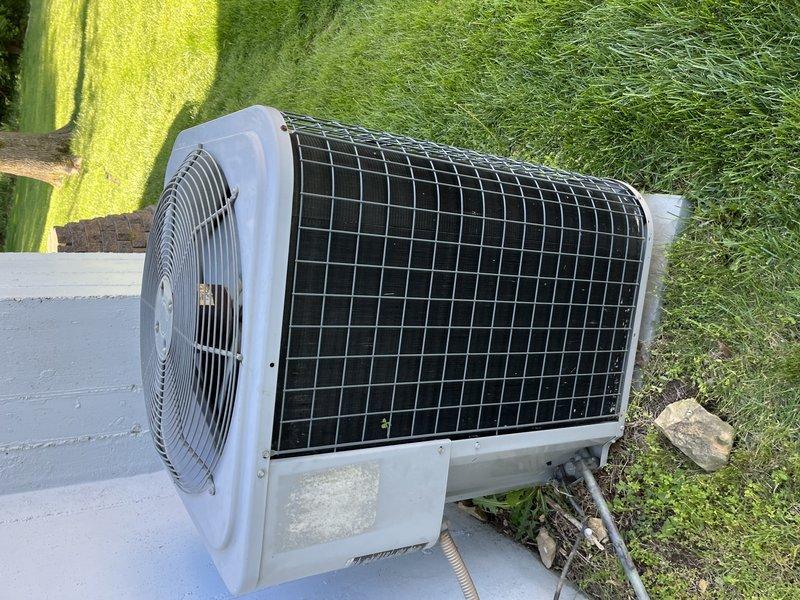 Completed comprehensive cooling maintenance on a 9-year-old residential air conditioning system. Performed AC tune-up including inspection of outdoor condenser unit, electrical components, and capacitor connections. System tested and confirmed operational with all components functioning properly.