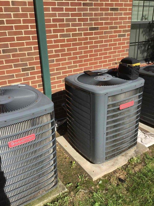 Responded to commercial no-cooling call and arrived on-site before requested 4 PM deadline. Upon inspection of multiple outdoor condenser units positioned along brick exterior, diagnosed system issues and performed necessary repairs. Applied appropriate HVAC treatment products to unit #828, verified refrigerant line connections, and restored cooling operation to affected system.