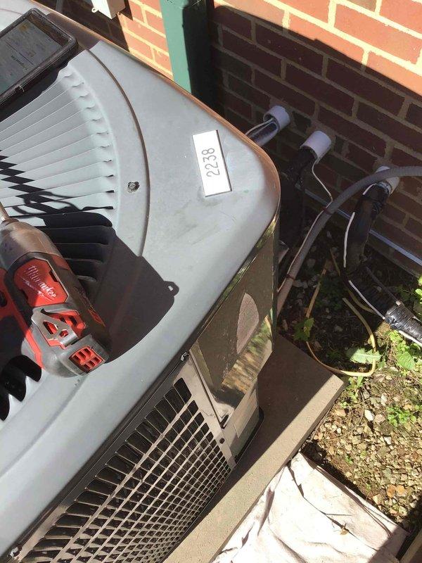 Responded to commercial no-cooling call and arrived on-site before requested 4 PM deadline. Upon inspection of multiple outdoor condenser units positioned along brick exterior, diagnosed system issues and performed necessary repairs. Applied appropriate HVAC treatment products to unit #828, verified refrigerant line connections, and restored cooling operation to affected system.
