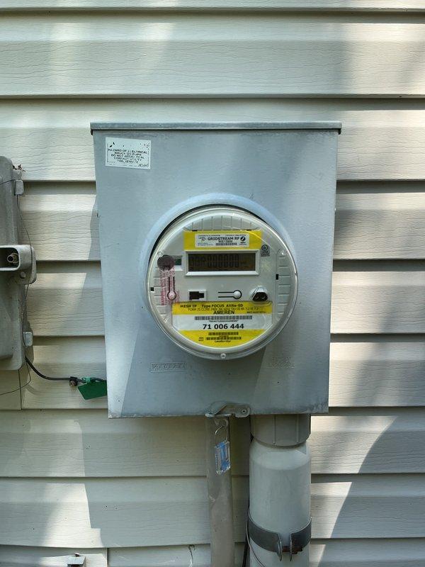 Completed comprehensive electrical inspection of residential property exterior. Evaluated electrical meter installation, service entrance equipment, and associated conduit connections for code compliance and safety. Inspected HVAC disconnect, grounding system, and weatherhead components; documented existing conditions with photographs showing meter enclosure, service panel connections, and outdoor equipment electrical supply. All systems found to be functioning properly with no immediate safety concerns identified.