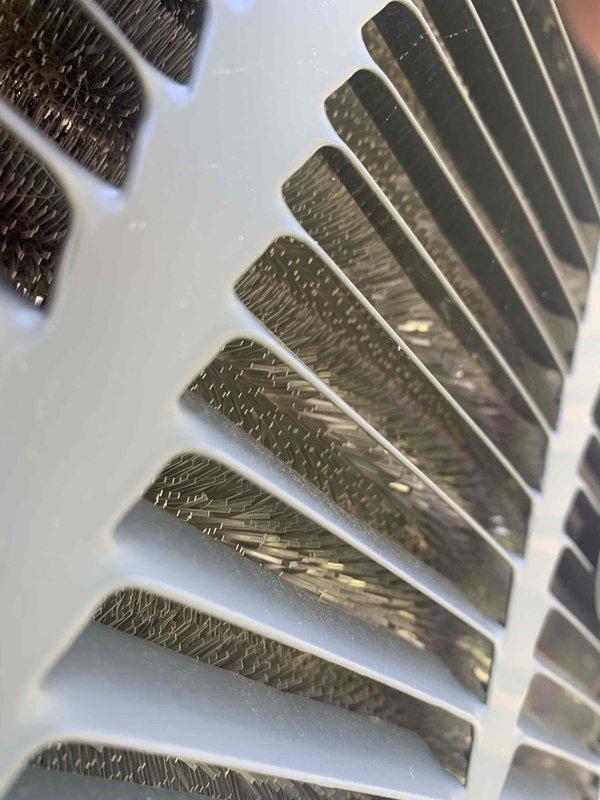 Completed comprehensive cooling system tune-up on a 10-year-old residential AC unit located at side of home. Performed standard maintenance protocol including inspection of evaporator coil fins, electrical connections, control board functionality, and blower motor assembly. All components found operating within normal parameters with no immediate repairs required at time of service.