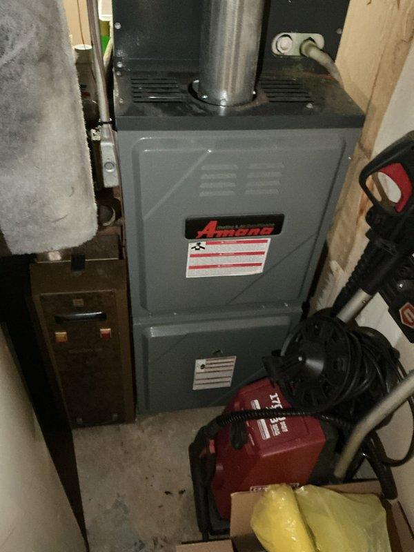 Completed comprehensive cooling tune-up on outdoor condensing unit located in backyard. Performed full system inspection of Amana HVAC system including furnace and air handler in basement utility area, checked and evaluated air return filter condition, verified proper airflow throughout system, and documented equipment condition with photos. All components operating within normal parameters upon completion of preventive maintenance service.