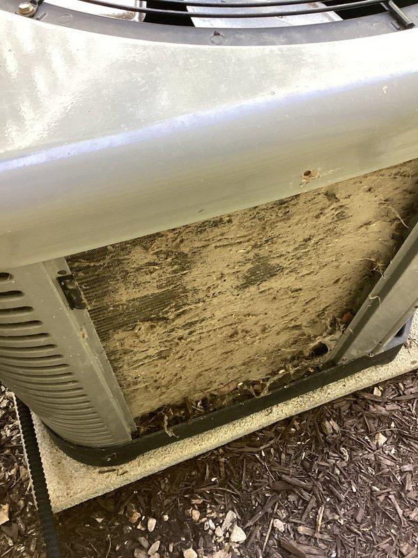 Completed comprehensive AC tune-up on 3-year-old residential unit located at rear exterior of property for new customer under Home Depot service agreement #F58795910AC. Upon inspection, discovered evaporator coil with heavy accumulation of dirt, dust, and debris significantly restricting airflow and reducing system efficiency. Performed thorough coil cleaning to restore proper heat transfer capabilities. Inspected indoor air handler control board and verified all electrical connections secure despite somewhat disorganized wiring configuration. Checked refrigerant lines, condensate drainage system, and all mechanical components for proper operation. Unit returned to normal operating parameters following maintenance procedures.