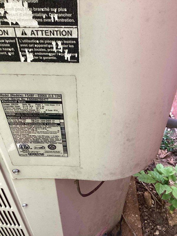 Responded to no cooling call on 16-year-old residential air conditioning system. Upon arrival, found outdoor unit running with visible frost formation on suction line, indicating restricted airflow or low refrigerant charge. Performed system diagnostics on Goodman FS4BF-036KA 3-ton unit and inspected indoor air handler components. Identified evaporator coil freezing due to restricted airflow caused by dirty filter and reduced system charge. Removed access panels, documented existing conditions with photos showing internal wiring, blower assembly, and condensate drainage system. Checked electrical connections, capacitor readings, and verified blower motor operation. Inspected outdoor unit nameplate data and refrigerant line connections. System required filter replacement and refrigerant charge adjustment to restore proper cooling operation.