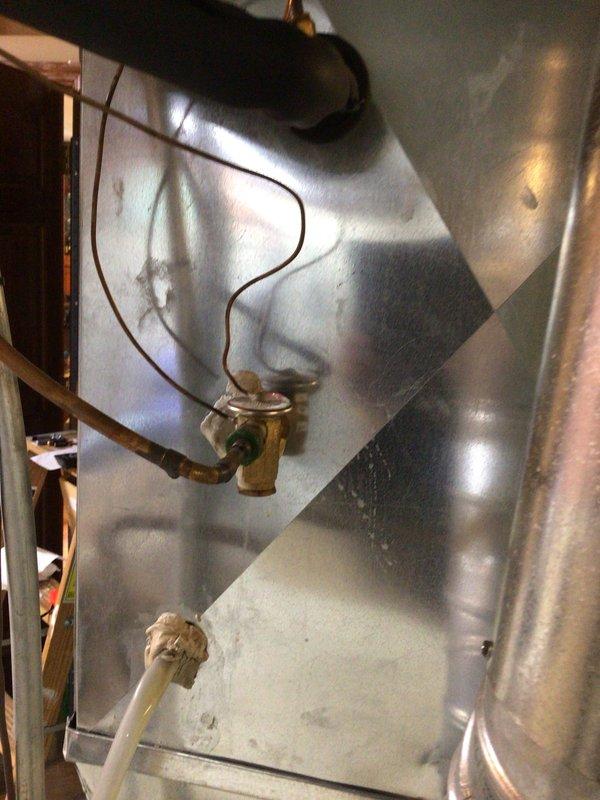 Completed comprehensive cooling tune-up on single outdoor AC unit mounted on bracket at side of residence. Performed standard maintenance protocol including inspection of air handler interior components, evaporator coil, condensate drain line, and air filtration system. All components found operational with normal wear patterns; system returned to service in proper working condition.
