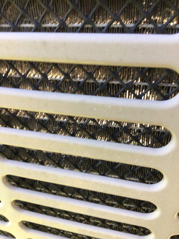 Completed comprehensive cooling tune-up on single outdoor AC unit mounted on bracket at side of residence. Performed standard maintenance protocol including inspection of air handler interior components, evaporator coil, condensate drain line, and air filtration system. All components found operational with normal wear patterns; system returned to service in proper working condition.
