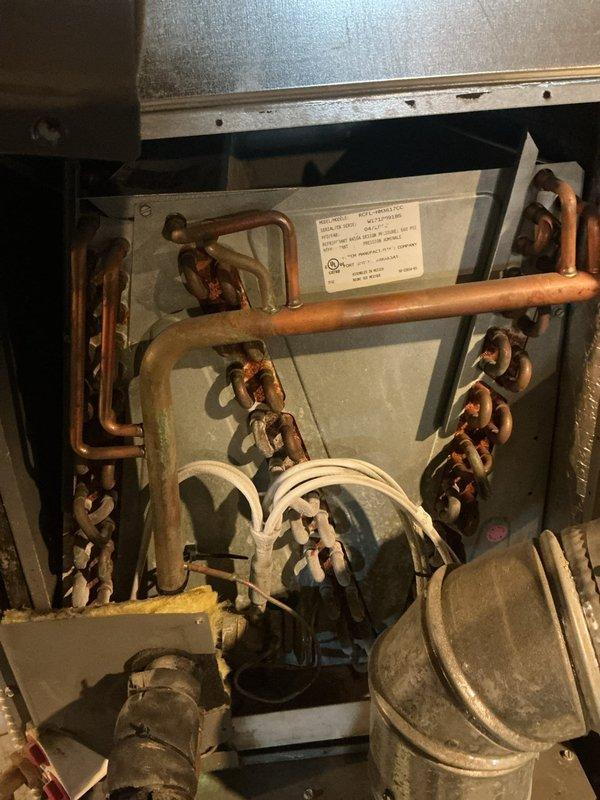 Responded to service call for furnace water leak and insufficient air conditioning cooling. Performed diagnostic inspection of basement furnace and outdoor condensing unit. Inspected refrigerant lines, service valves, and internal components for proper operation. Addressed water leakage issue at furnace and evaluated A/C system performance to restore proper cooling capacity.