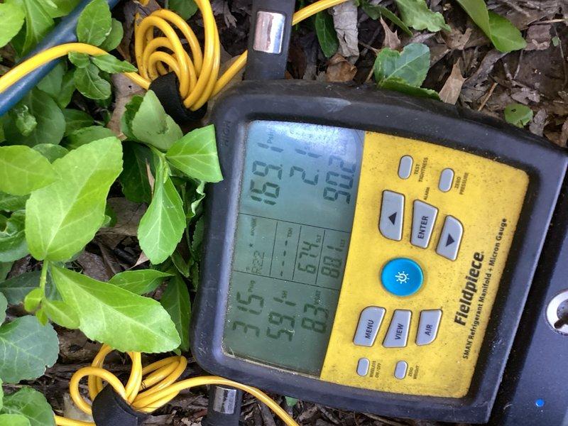 Responded to cooling efficiency complaint on 15-year-old air conditioning system. Performed diagnostic testing using digital manifold gauges to assess refrigerant pressures and system performance. Added refrigerant charge to restore proper cooling capacity. Replaced faulty condensate drain line in basement that was improperly fitted and causing water leakage. System tested and confirmed operating within normal parameters upon completion.