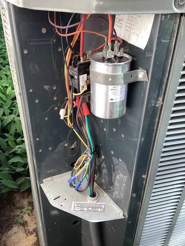 Completed scheduled cooling maintenance on 9-year-old Trane air conditioning system. Performed comprehensive AC tune-up including visual inspection of electrical components, capacitor assessment, and system operational verification. Inspected dual-run capacitor showing signs of age with surface corrosion and discoloration; capacitor tested within acceptable parameters and remains functional. Checked all electrical connections, contactor operation, and wiring integrity. System operating properly at time of service completion.