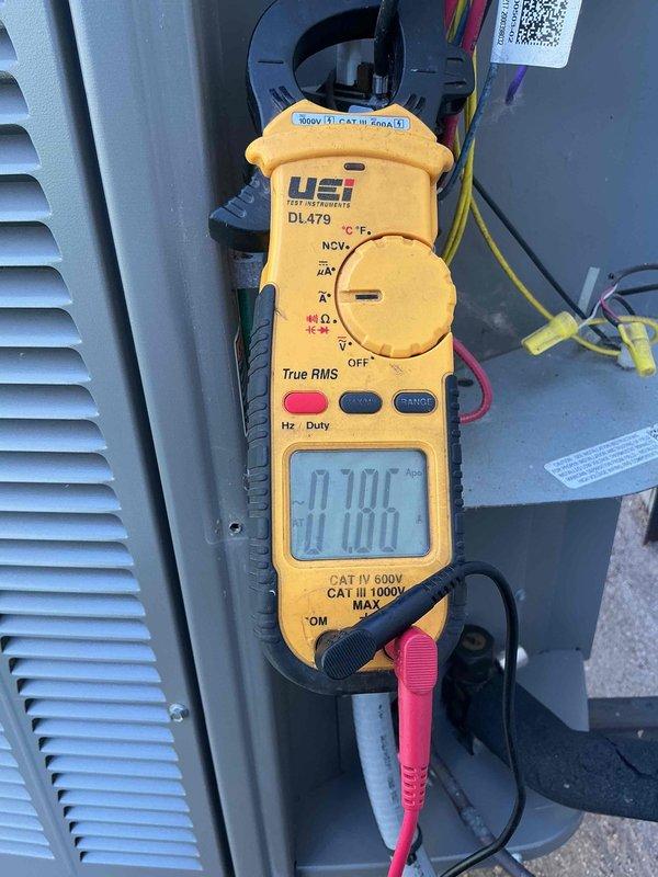 # HVAC Cooling System Tune-Up Completed

Performed comprehensive seasonal tune-up on 7-year-old residential air conditioning unit located at side of home. Conducted complete system diagnostics using digital multimeter to verify electrical performance, measuring voltage and amperage at critical components to ensure proper operation within manufacturer specifications. All electrical connections were inspected and tested, with readings confirming system is operating safely and efficiently. Standard preventive maintenance procedures completed on single cooling unit during scheduled afternoon service window.