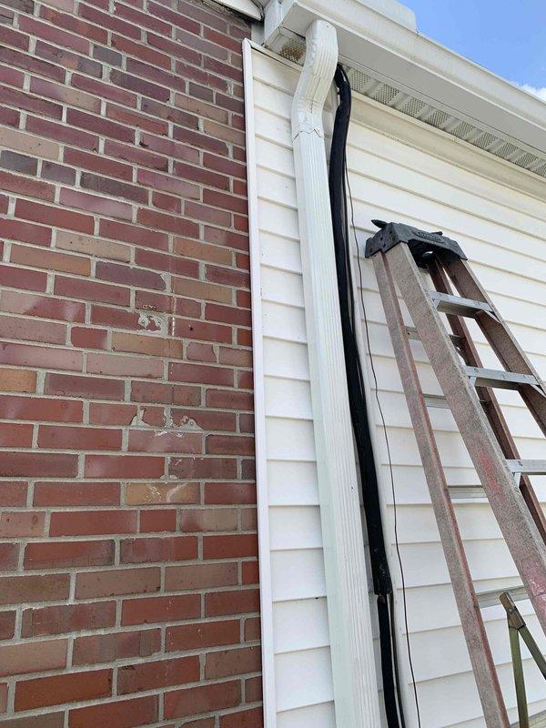 Installed suction line insulation on exterior HVAC refrigerant lines using customer-supplied materials. System tested and confirmed operational for both heating and cooling modes upon completion.